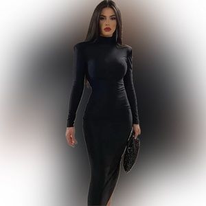 Bodycon long sleeve, long dress with slight shoulder pads.